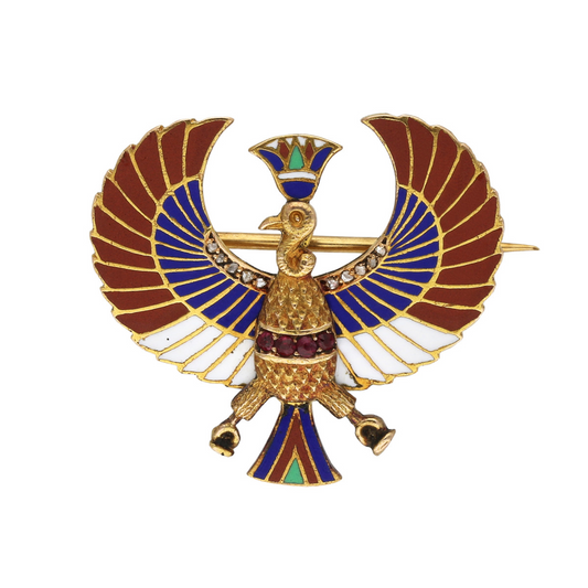 Art Deco diamond, ruby, enamel and 18-karat gold Egyptian Revival Phoenix brooch, circa 1925.