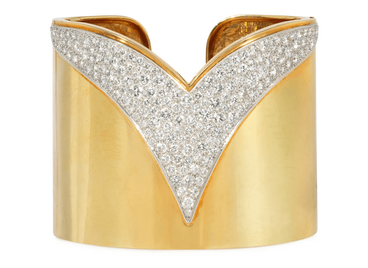 Diamond and 18-karat gold hinged cuff bracelet, signed Cartier and numbered, circa 1970s.
