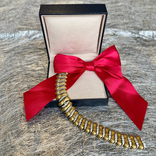 Diamond and 18-karat gold bracelet.