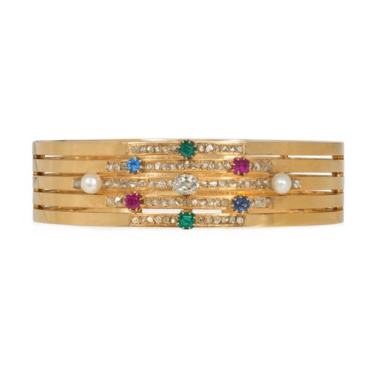 Diamond, emerald, ruby, sapphire, pearl and 18-karat gold bracelet, circa 1875.