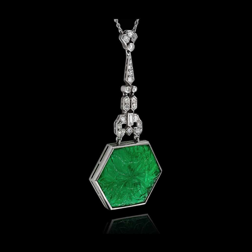 Art Deco carved Colombian emerald, diamond and platinum necklace, circa 1925.
