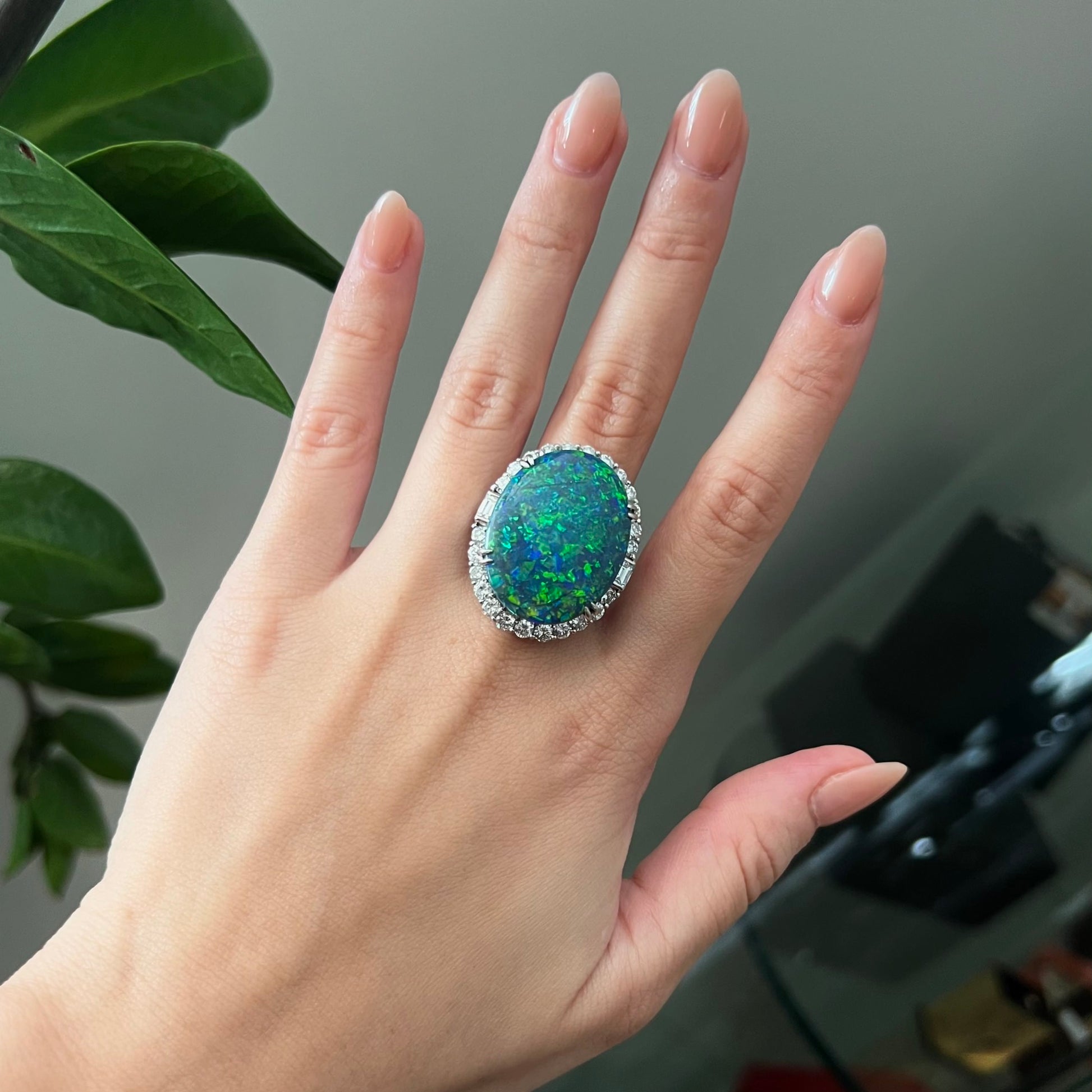 Post-1980s Platinum Black Opal & Diamond Ring worn on hand