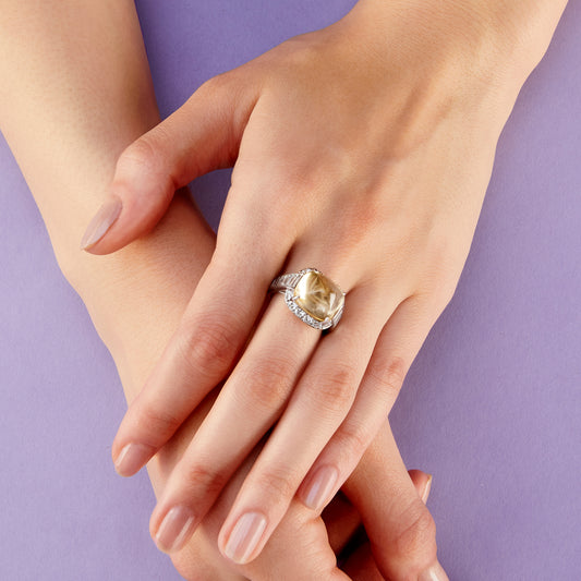 1980s Platinum Yellow Sapphire & Diamond Ring worn on hand