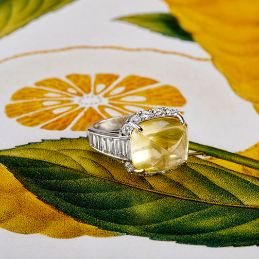 1980s Platinum Yellow Sapphire & Diamond Ring front side view