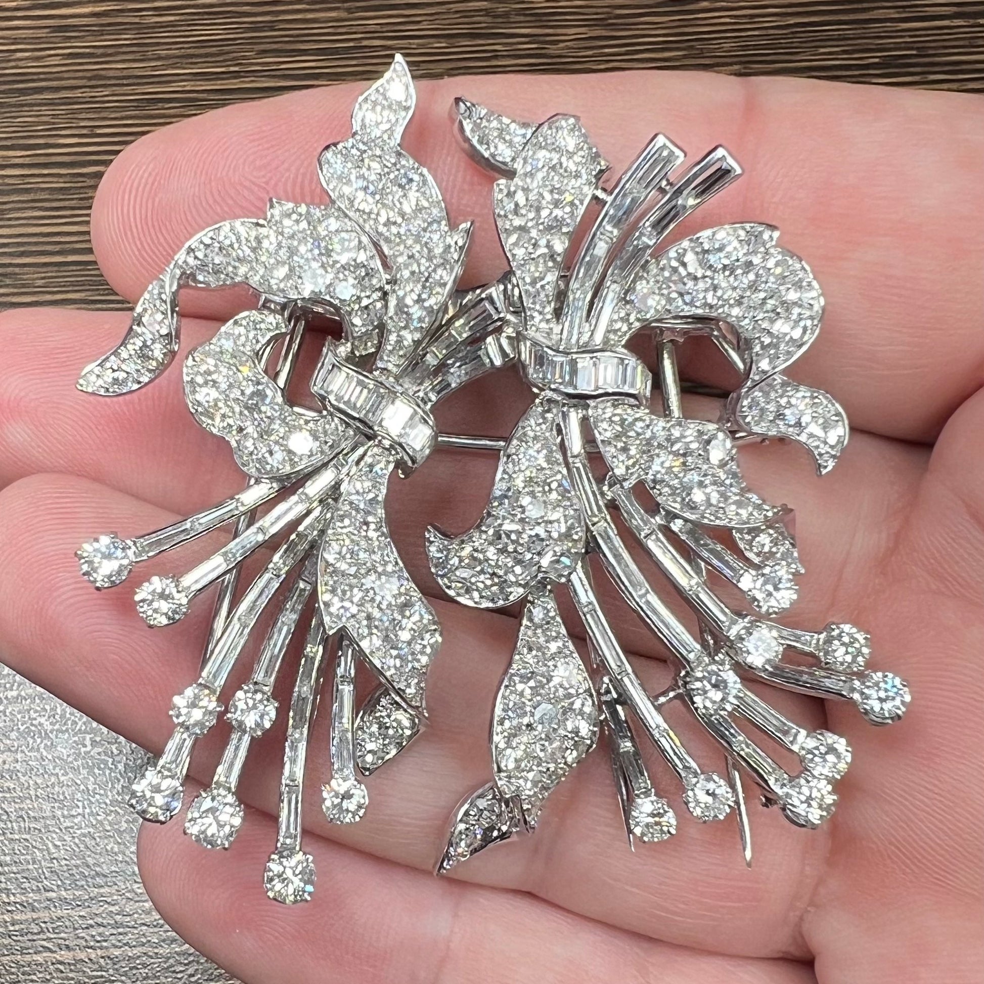 1950s Platinum Diamond Double Clips in hand