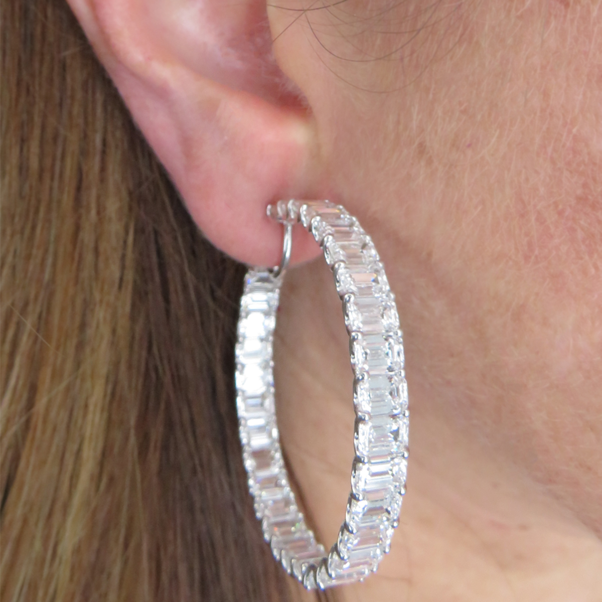 Post-1980s Platinum Diamond In/Out Hoop Earrings worn on ear