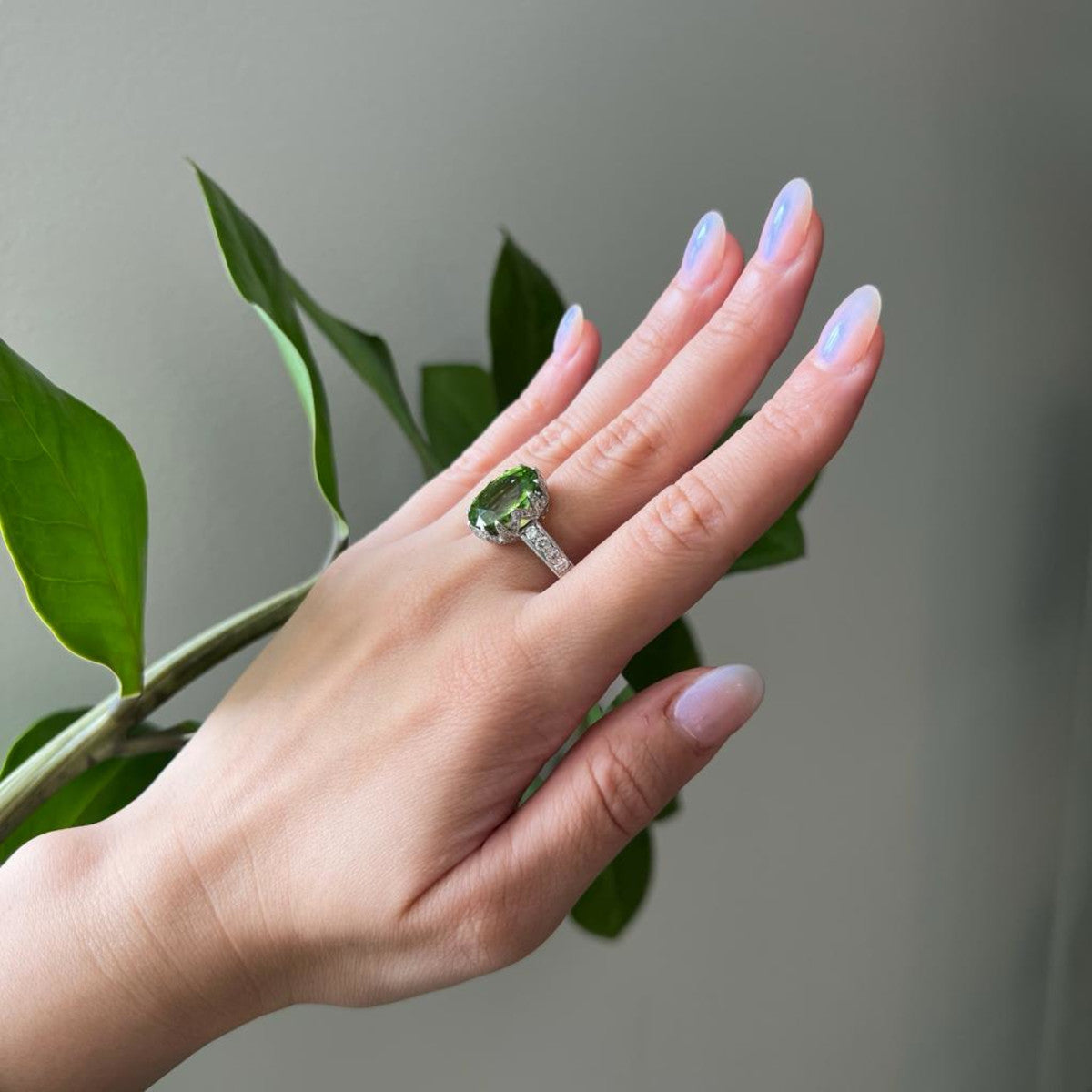 1950s 18KT White Gold Peridot & Diamond Ring worn on hand