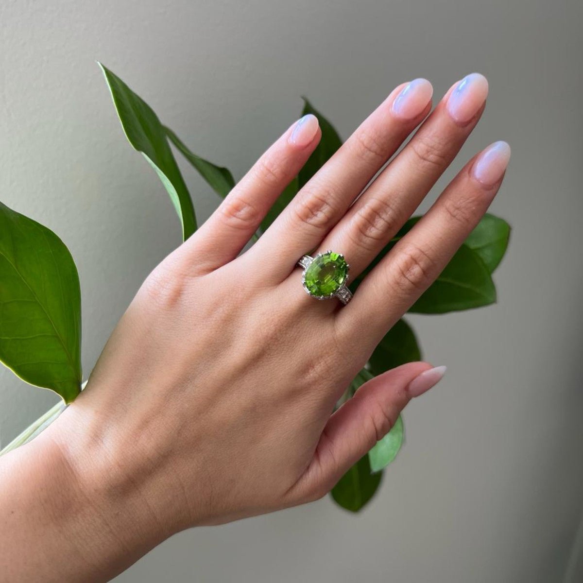 1950s 18KT White Gold Peridot & Diamond Ring worn on hand