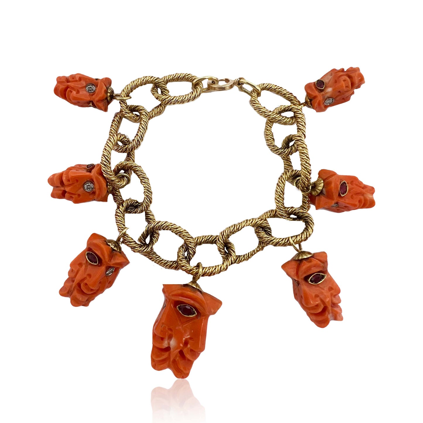 1970s 18KT Yellow Gold Carved Coral, Diamond & Ruby Charm Bracelet front view
