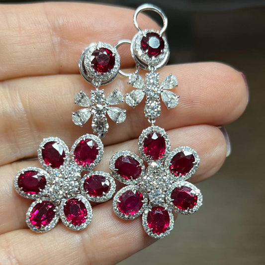Post-1980s 18KT White Gold Ruby & Diamond Flower Earrings in hand