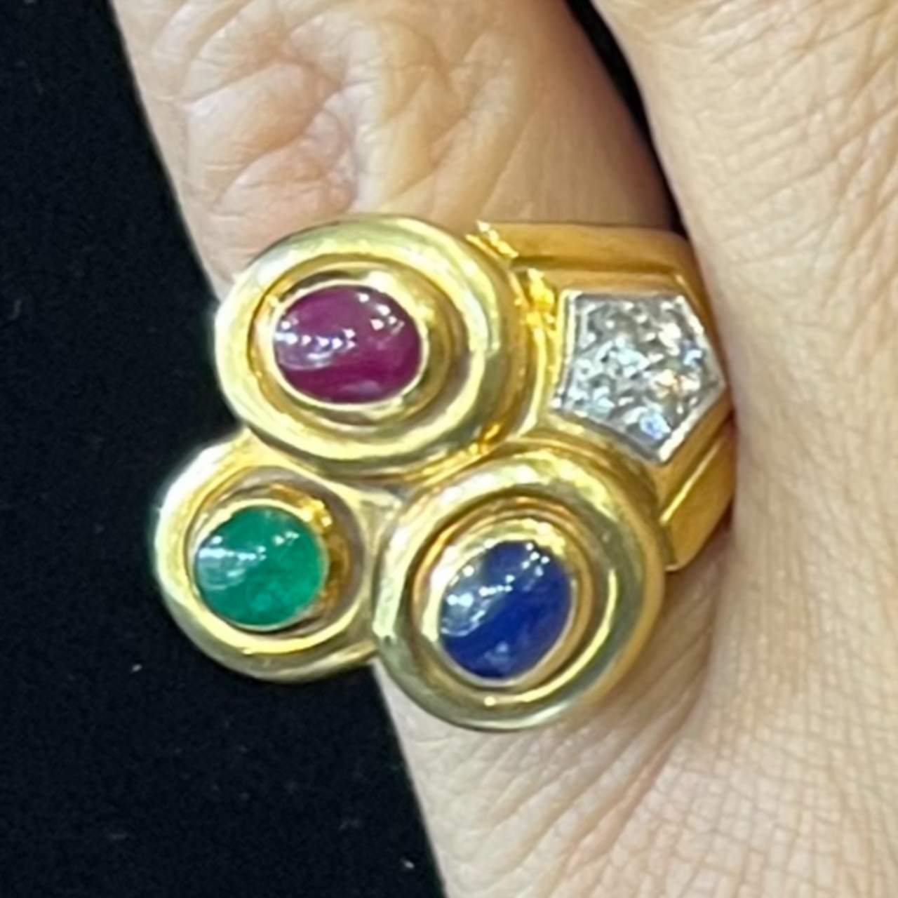 David Webb Post-1980s 18KT Yellow Gold & Platinum Ruby, Diamond, Emerald, & Blue Sapphire Ring worn on finger