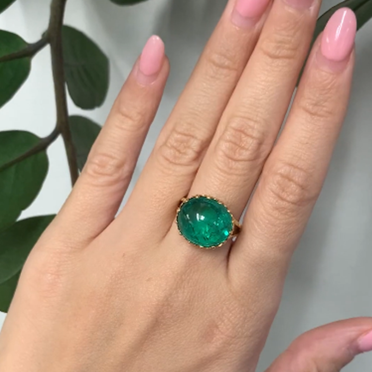 Antique 18KT Yellow Gold Colombian Emerald Ring worn on hand