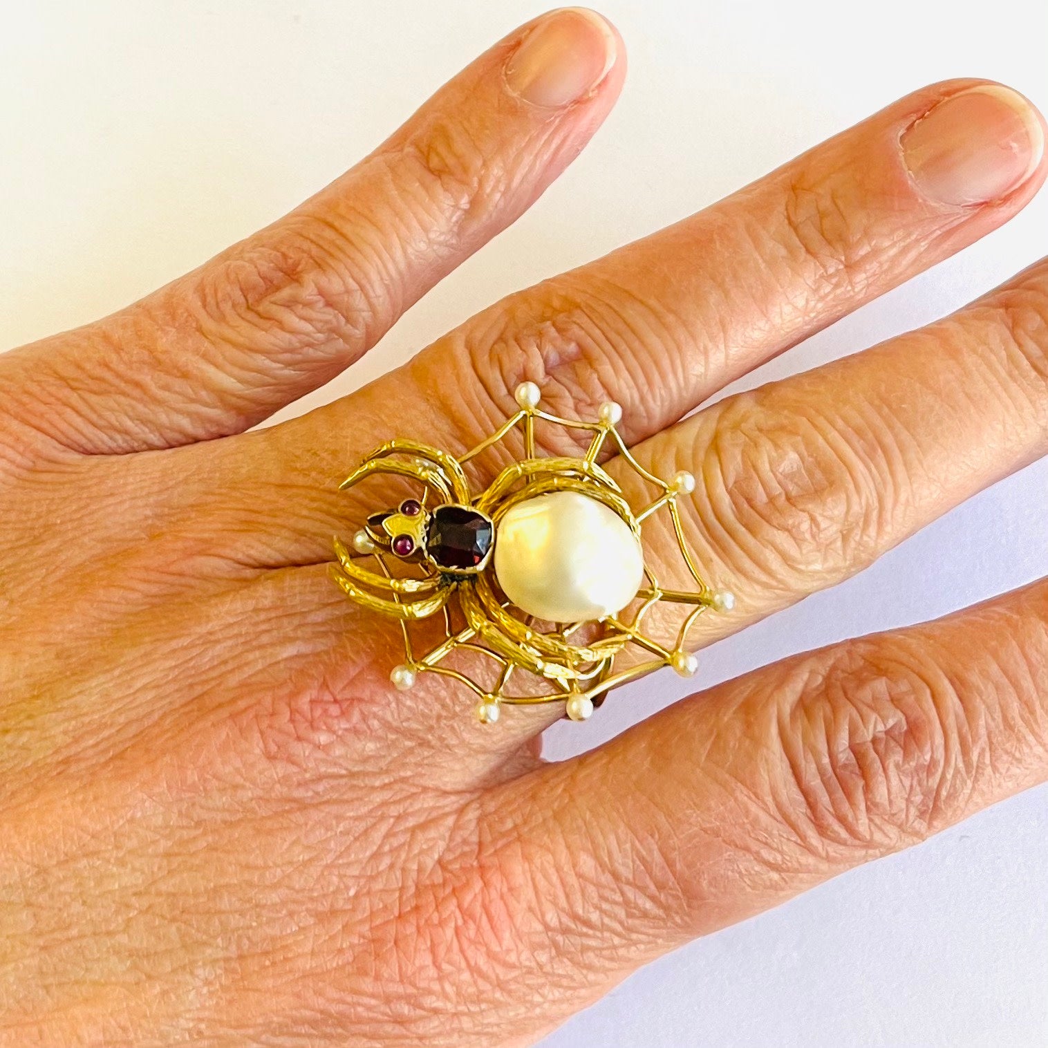Post-1980s 18KT Yellow Gold Natural Pearl & Garnet Spider Ring on finger