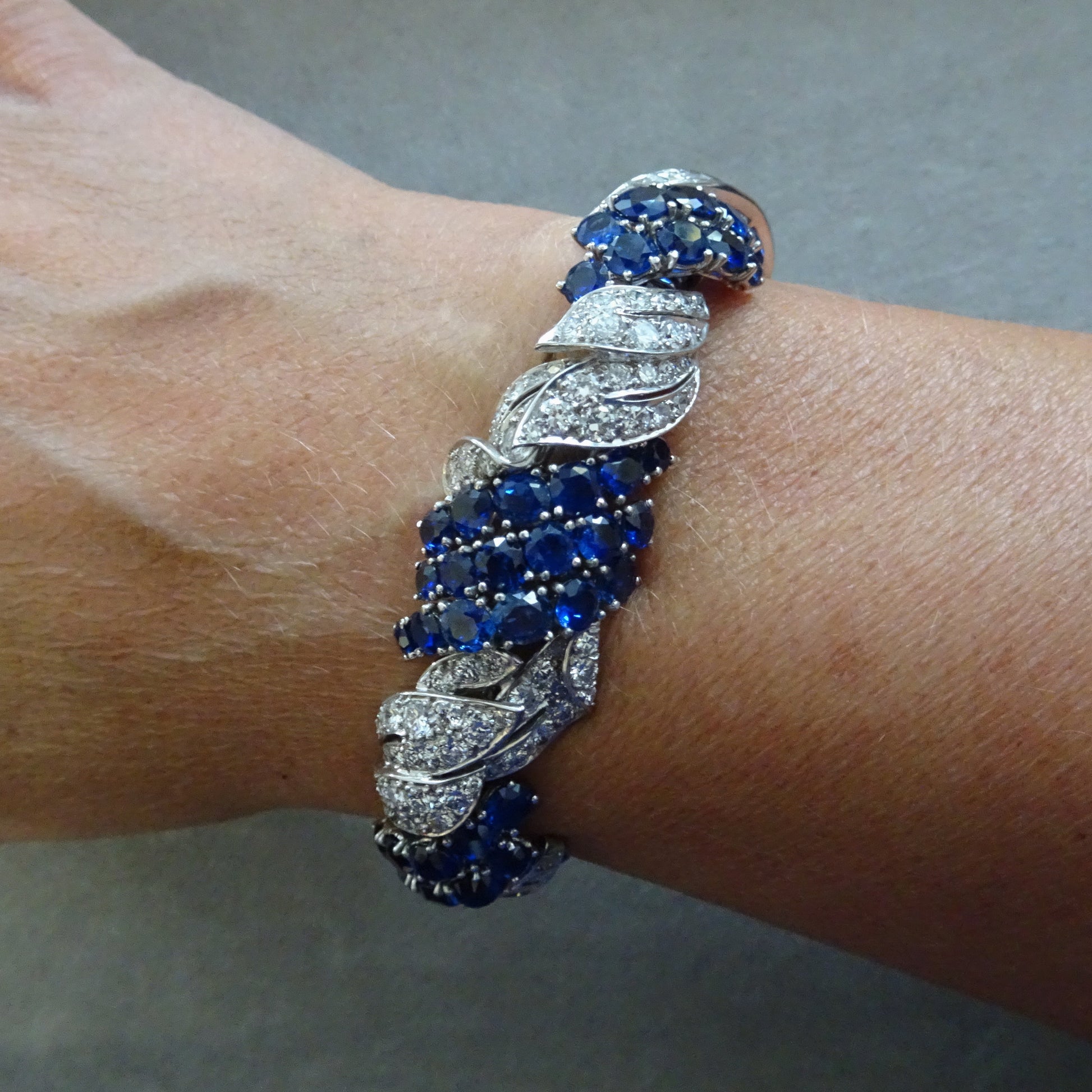 1940s Platinum Diamond & Blue Sapphire Bracelet on wrist