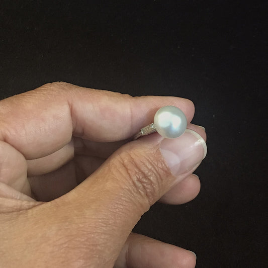 French Post-1980s Platinum Natural Pearl & Diamond Ring in hand