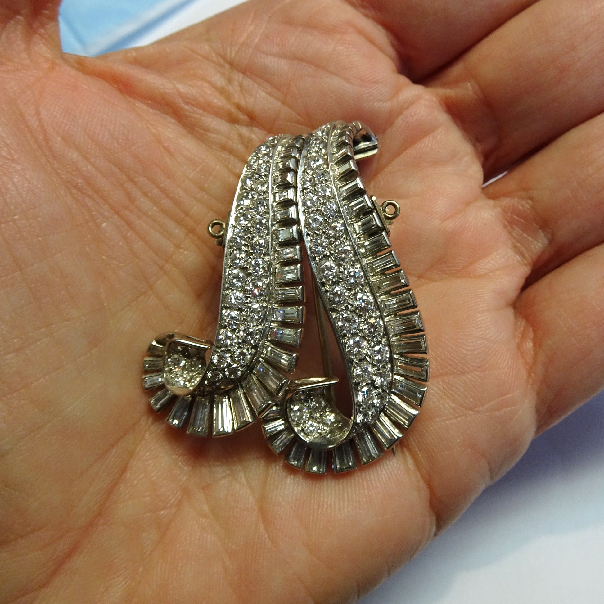 Ghiso 1940s Platinum Diamond Brooch in hand