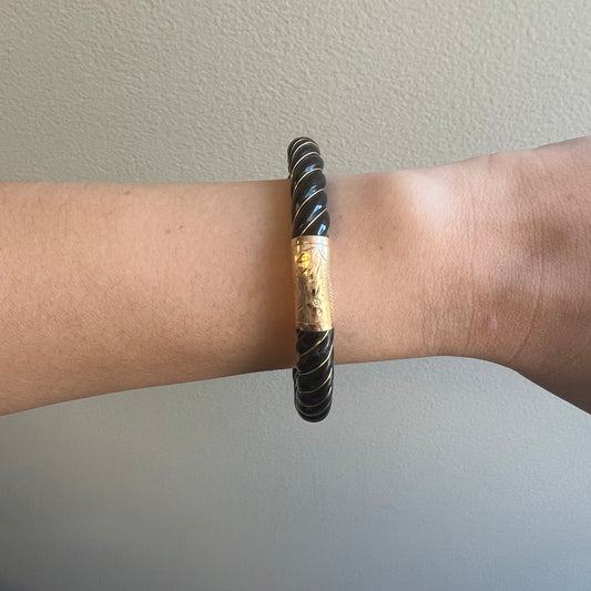 1970s 18KT Yellow Gold Jade Bangle Bracelet worn on wrist
