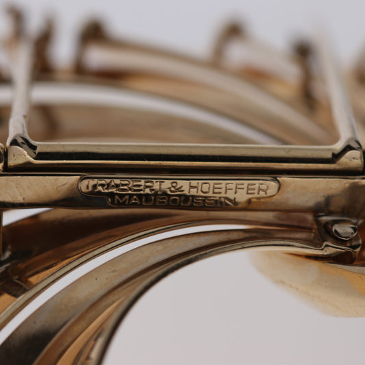 Trabert & Hoeffer Mauboussin 1950s 18KT Yellow Gold Brooches close-up of signature