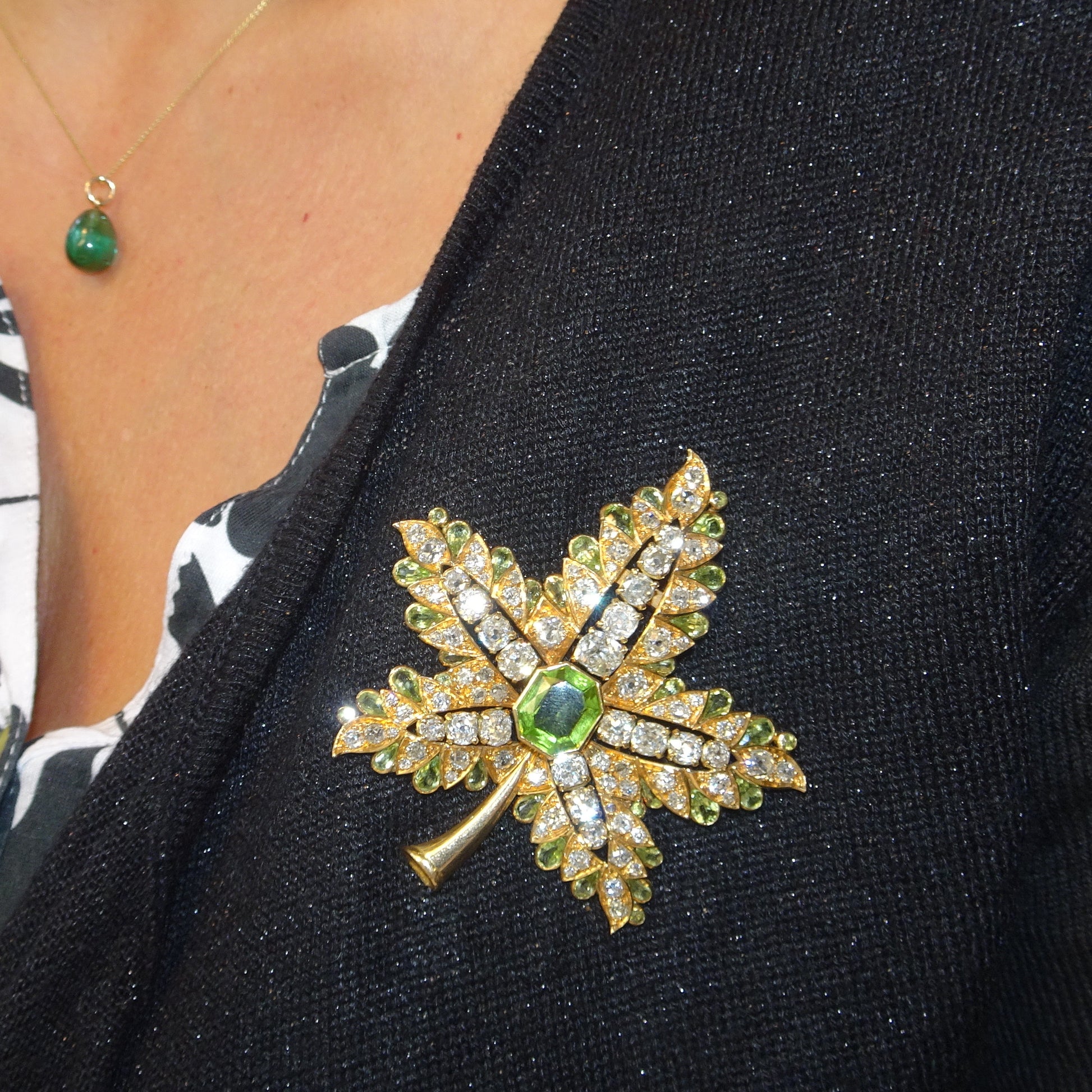 René Boivin 1940s 18KT Yellow Gold Diamond & Peridot Leaf Brooch worn on blouse