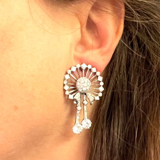 Platinum Diamond Earrings on ear