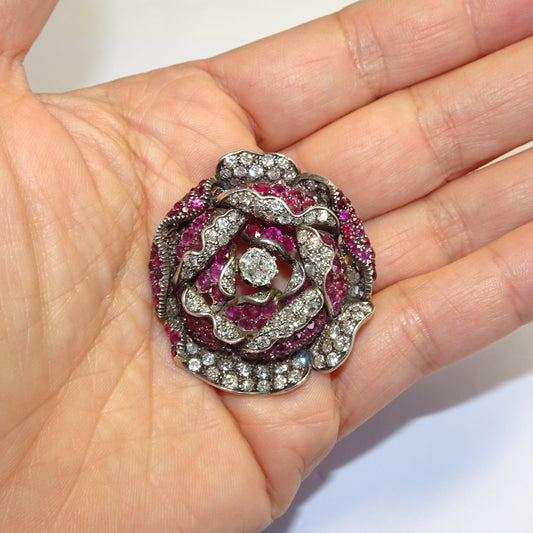 Victorian Silver & 18KT Yellow Gold Ruby & Diamond Flower Brooch in hand
