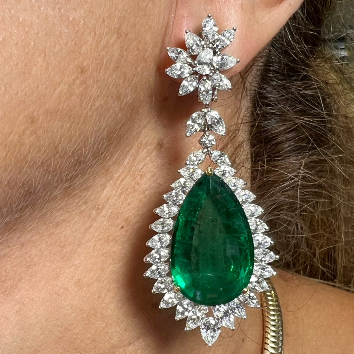 Post-1980s Platinum & 18KT White Gold Emerald & Diamond Earrings worn on ear