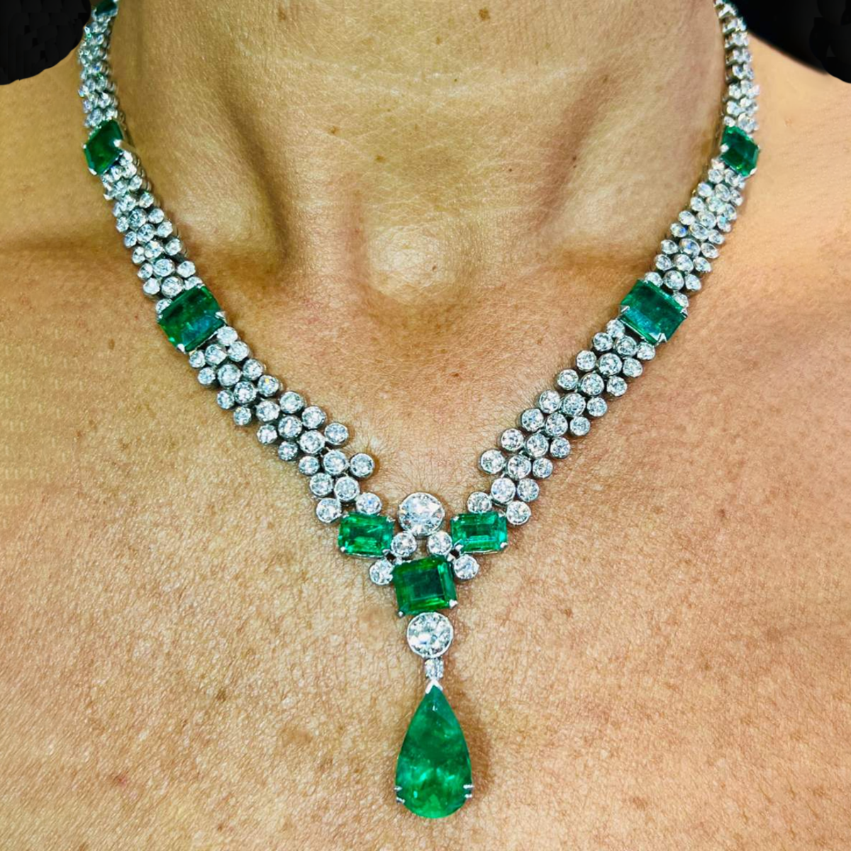 1950s Platinum Emerald & Diamond Necklace worn on neck