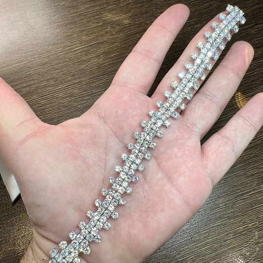 Calderoni Post-1980s Platinum Diamond Bracelet in hand