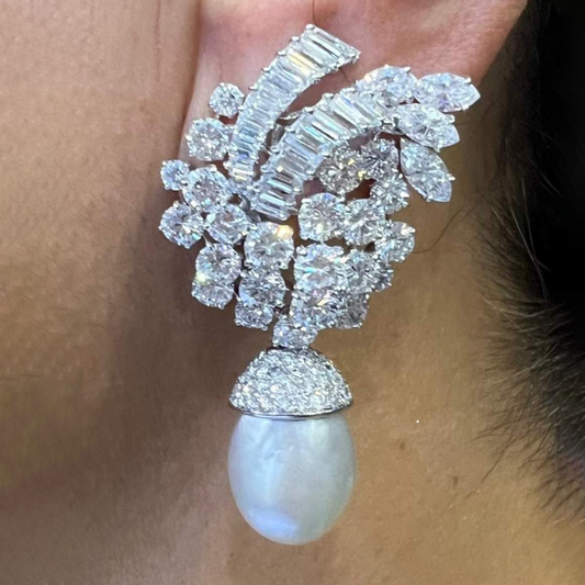 Bulgari 1960s Platinum Diamond & Natural Pearl Earrings worn on ear