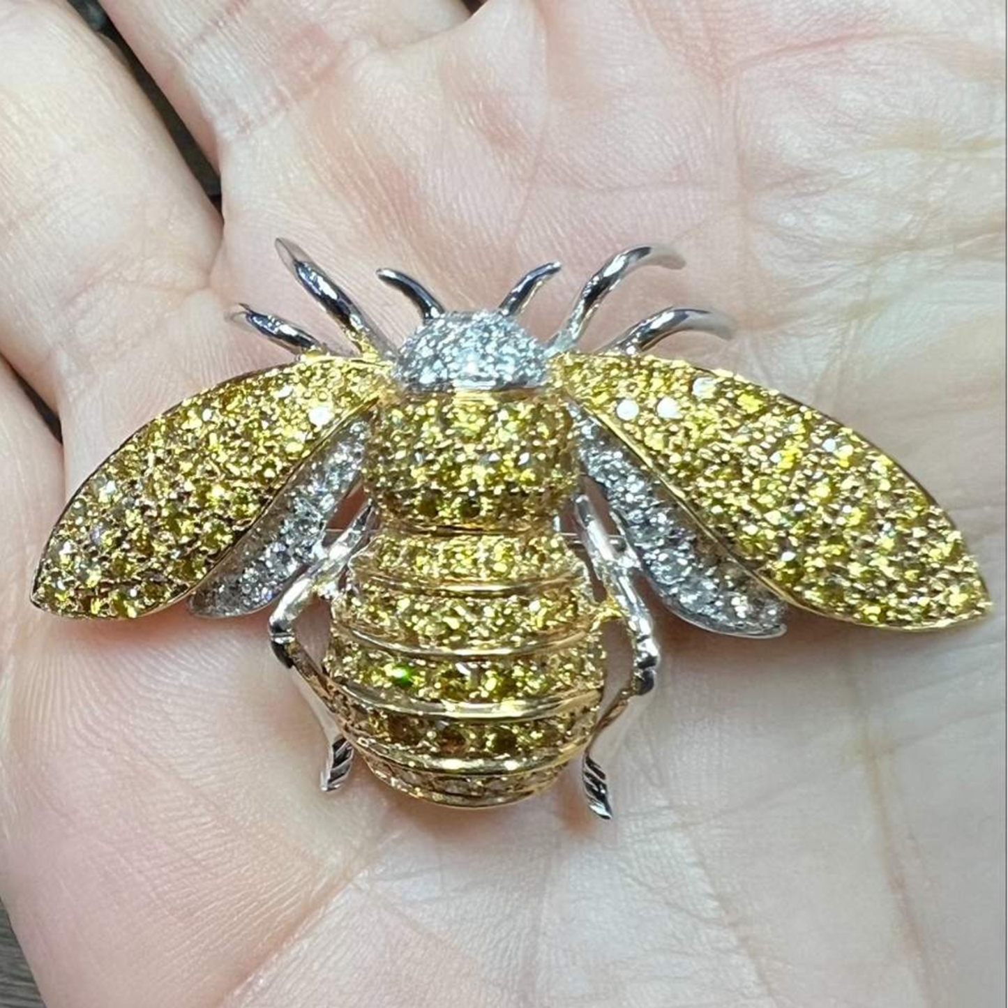 Post-1980s 18KT Yellow & White Gold Diamond Bumble Bee Brooch in hand