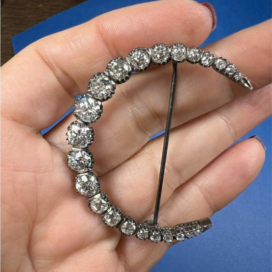 Post-1980s Platinum Diamond Crescent Brooch in hand