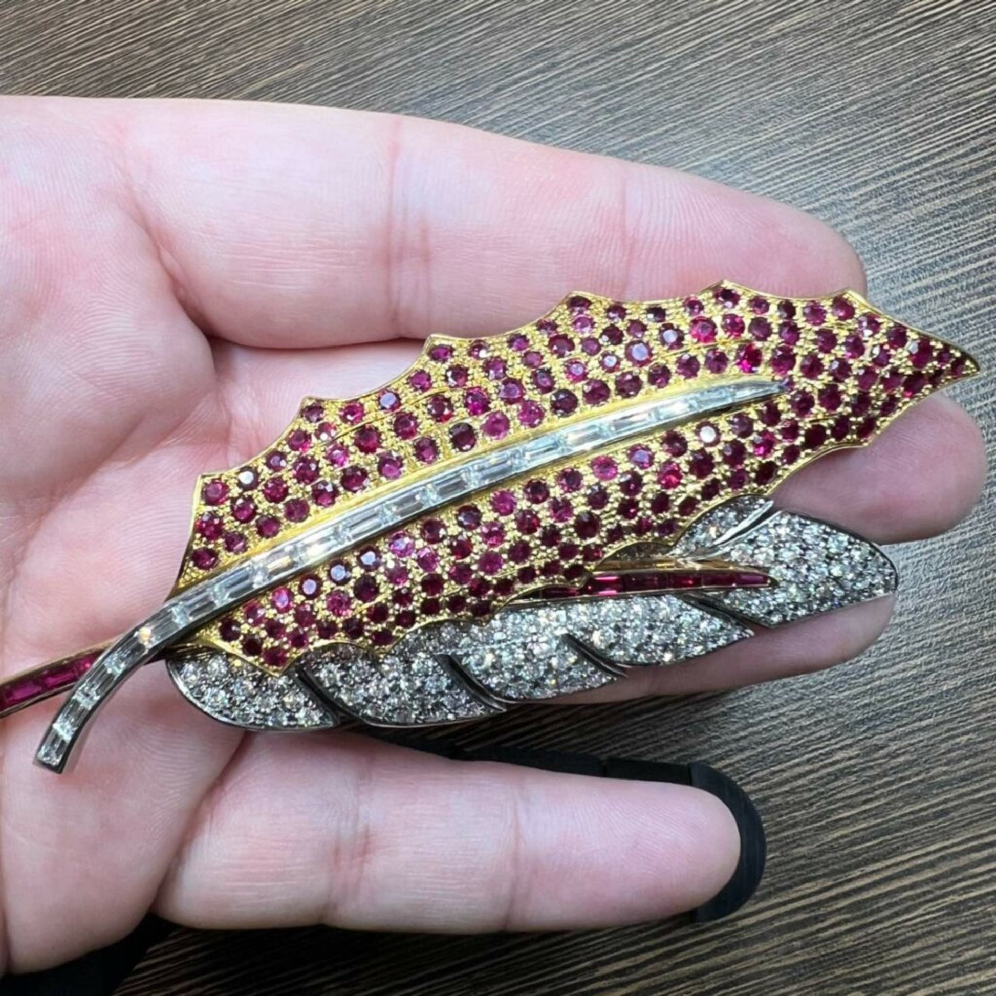 Post-1980s 18KT Yellow Gold Diamond & Ruby Brooch in hand