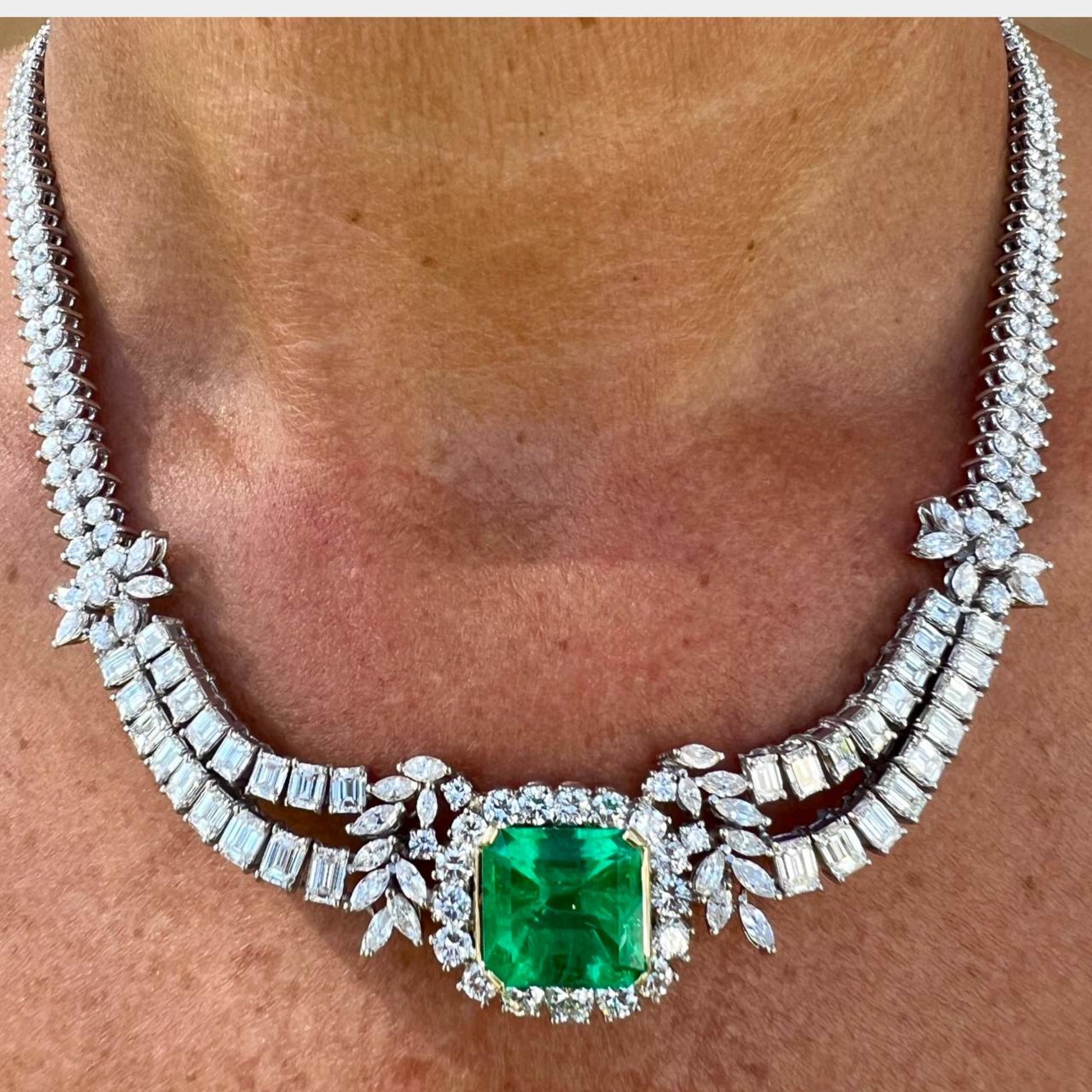 1950s 18KT White Gold Emerald & Diamond Necklace on neck