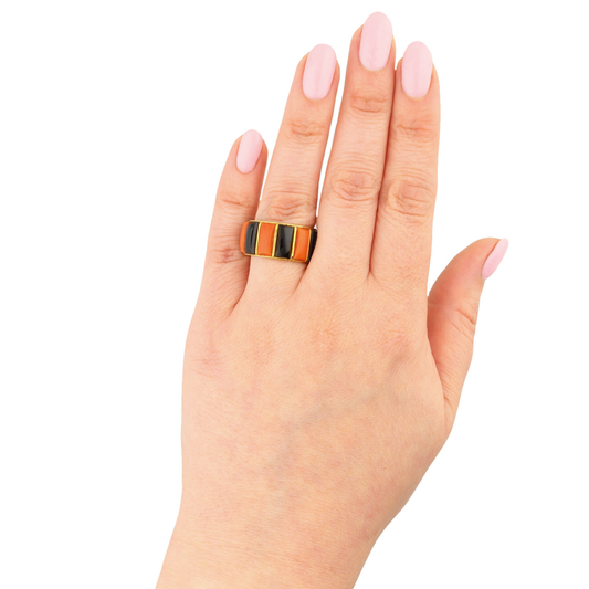 Cartier French 1970s 18KT Yellow Gold Coral & Onyx Ring on finger