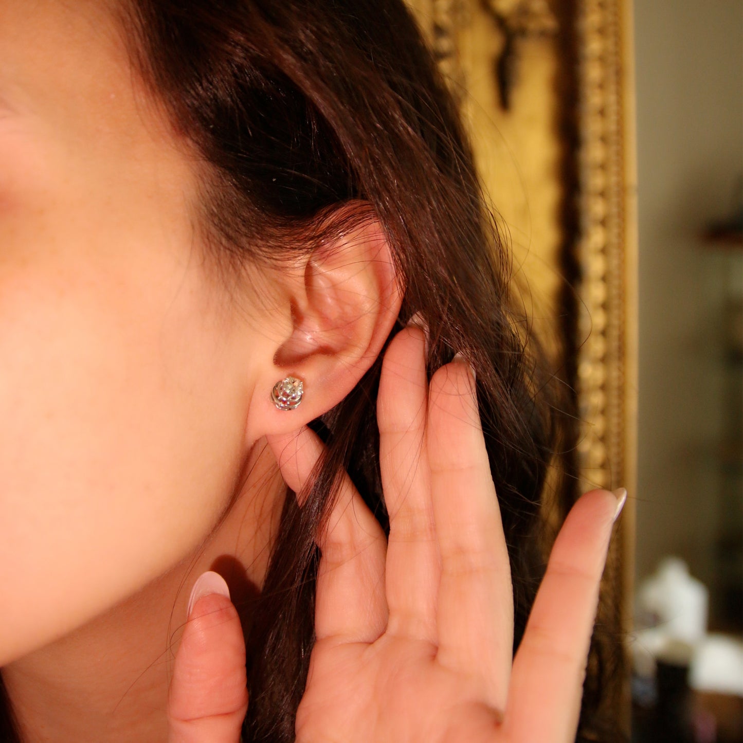 1950s Platinum Diamond Stud Earrings on ear