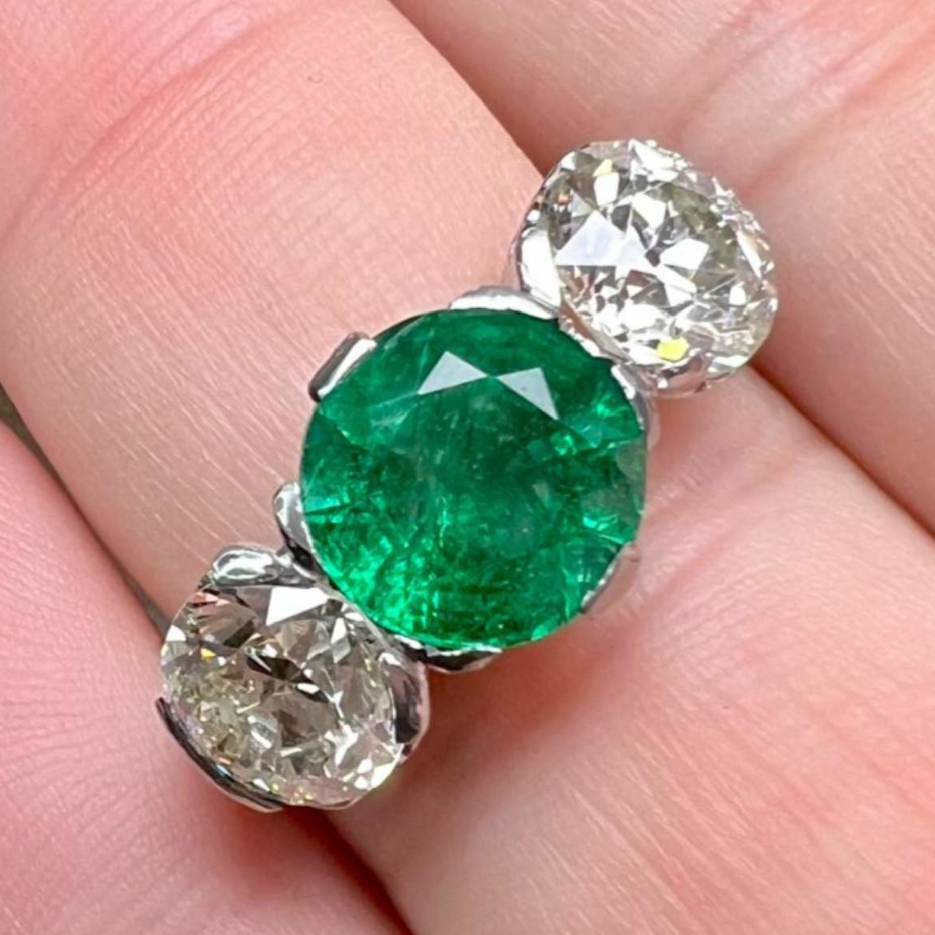Art Deco Platinum Emerald & Diamond Ring on finger