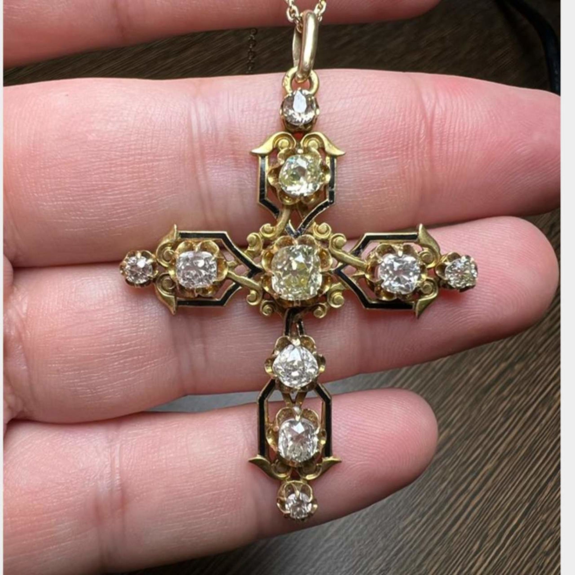 Victorian 14KT & 18KT Yellow Gold Diamond & Enamel Cross Pendant Necklace in hand