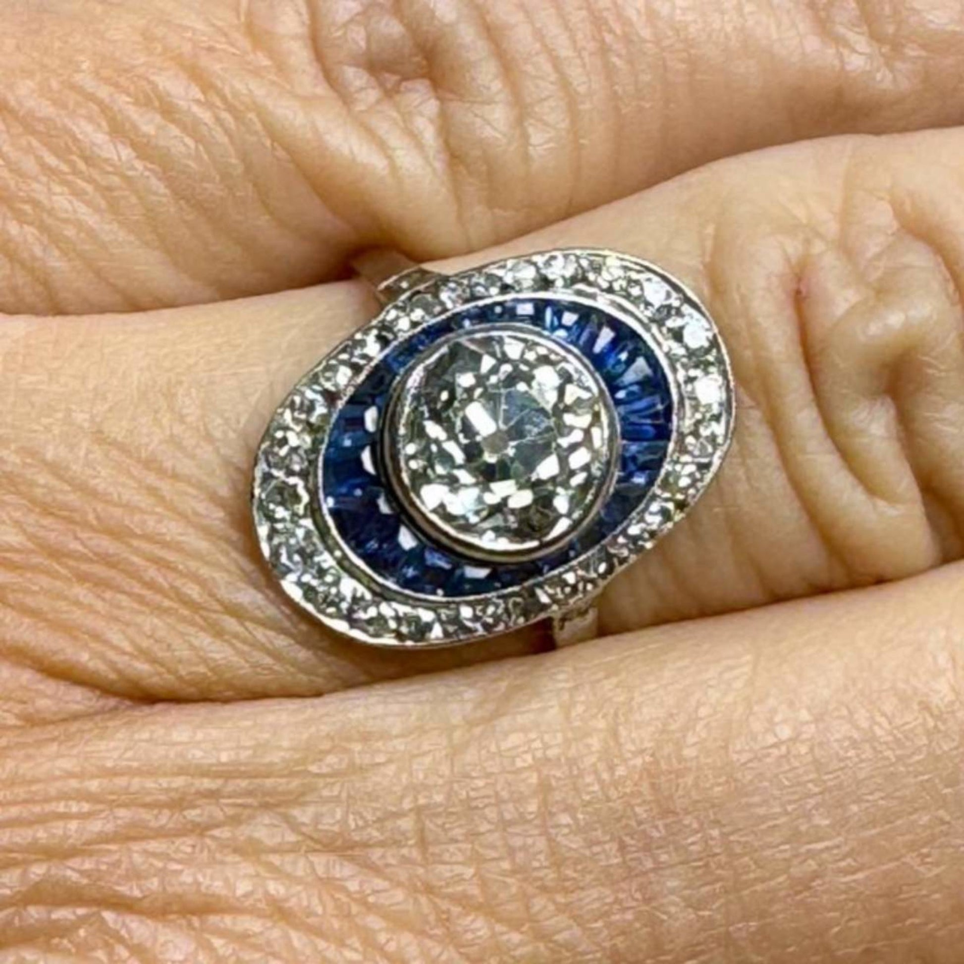 Art Deco Platinum Diamond & Sapphire Ring on finger