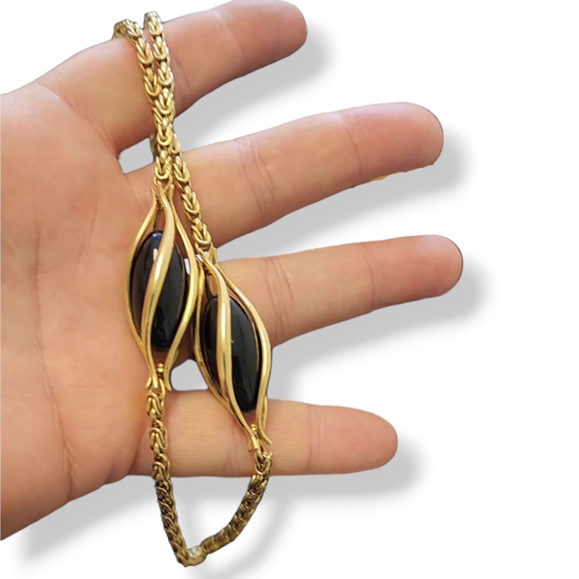Bucherer 1970s 18KT Yellow Gold Onyx Byzantine Link Chain Necklace in hand
