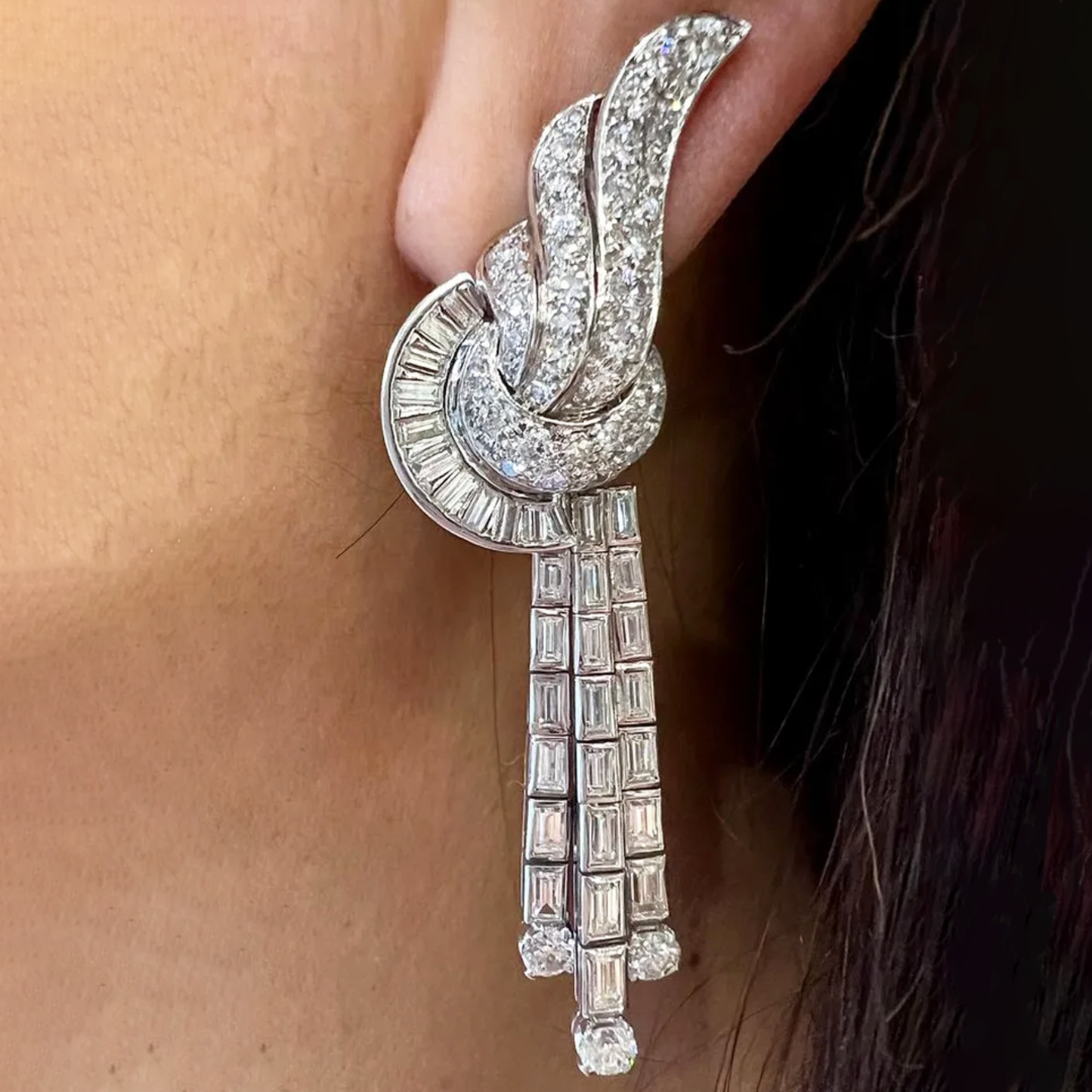 1950s Platinum Diamond Earrings on ear