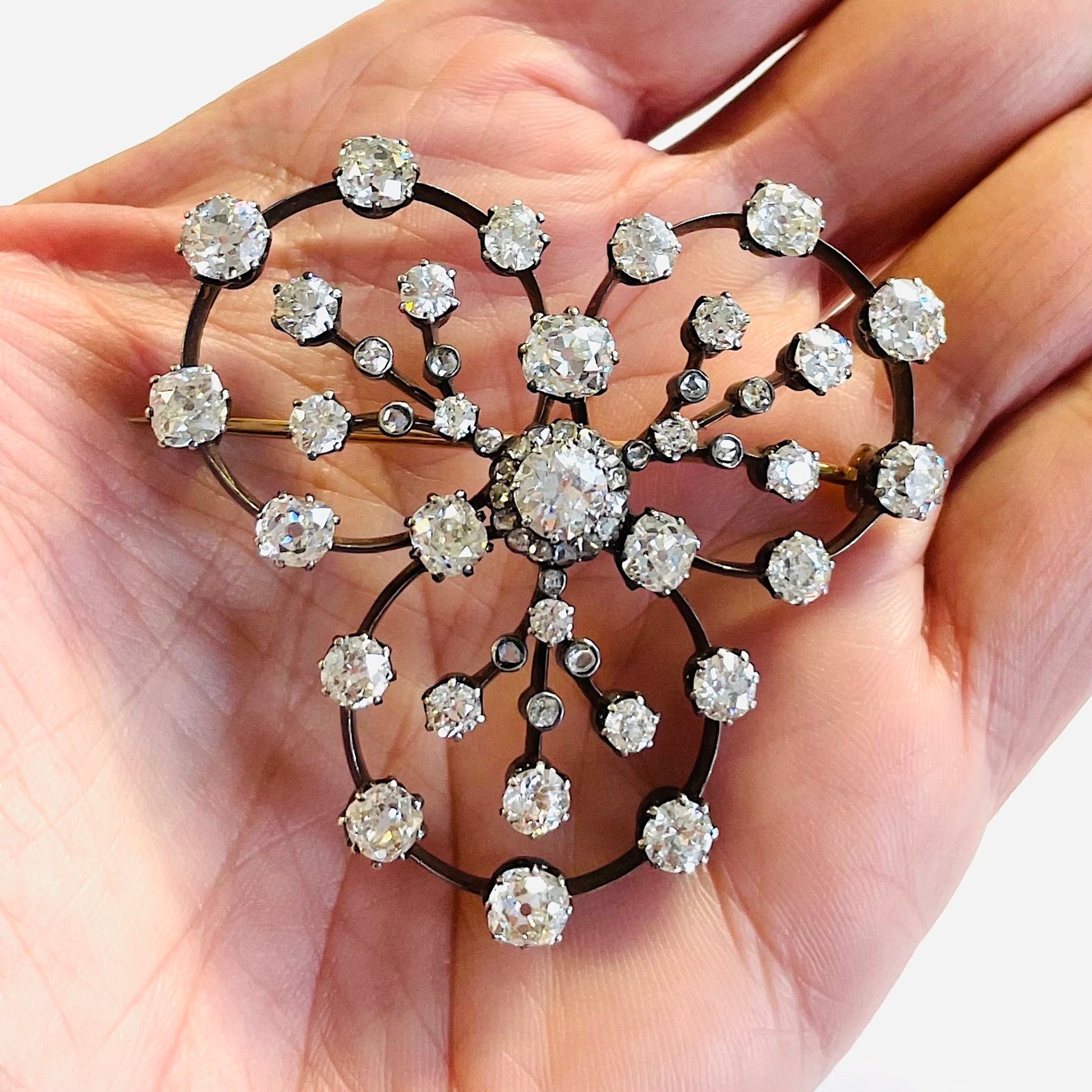 Victorian Silver & 18KT Yellow Gold Diamond Brooch in hand