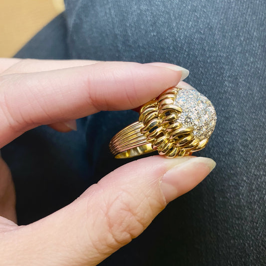 Van Cleef & Arpels 1950s yellow gold diamond ring in hand