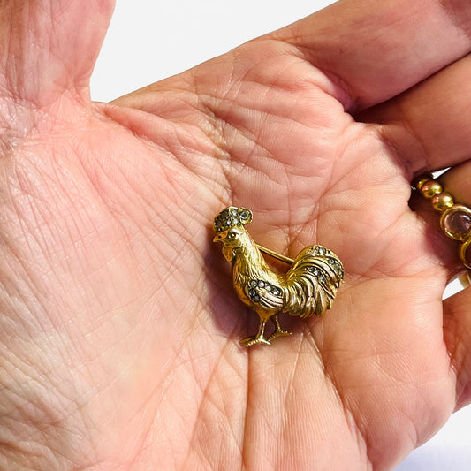Antique 18KT Yellow Gold Gold Diamond Rooster Brooch in hand