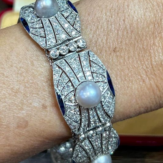 Art Deco Platinum Diamond, Natural Pearl & Sapphire Bracelet worn on wrist