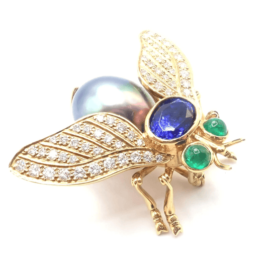 Tiffany & Co. 1980s 18KT Yellow Gold Diamond, Emerald, Tanzanite & Pearl Fly Brooch front