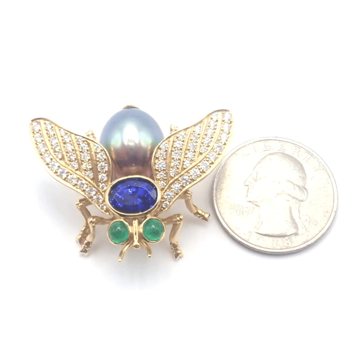 Tiffany & Co. 1980s 18KT Yellow Gold Diamond, Emerald, Tanzanite & Pearl Fly Brooch front