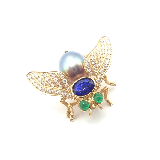 Tiffany & Co. 1980s 18KT Yellow Gold Diamond, Emerald, Tanzanite & Pearl Fly Brooch front