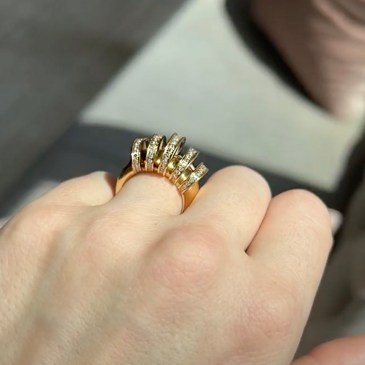 Post-1980s 18kt Yellow Gold & Diamond Cartier ring. Profile view worn on hand