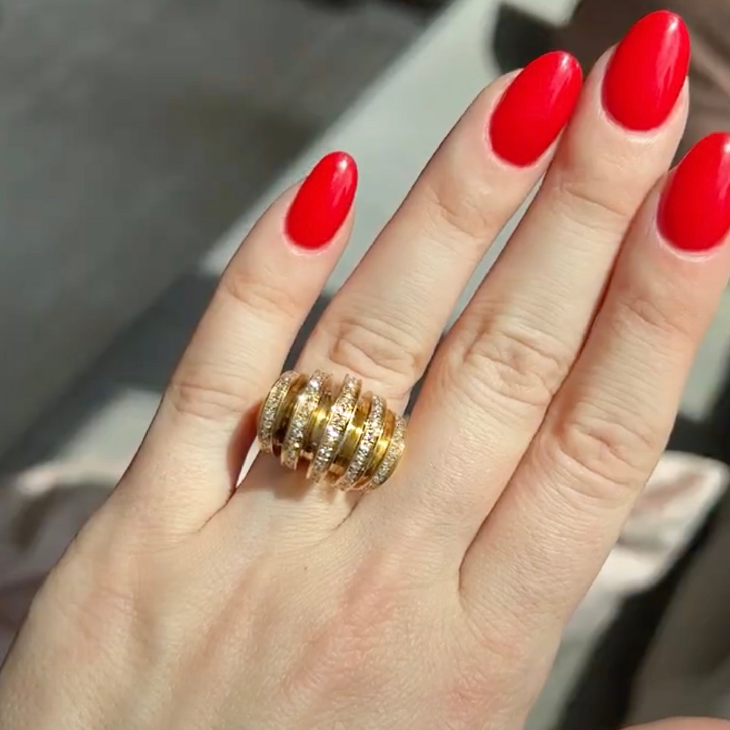 Post-1980s 18kt Yellow Gold & Diamond Cartier ring. Front view worn on hand