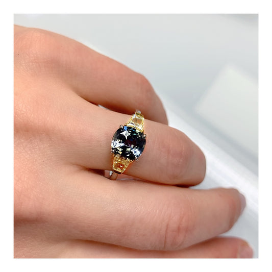 Contemporary Platinum & 18KT Yellow Gold Sapphire & Diamond Ring on finger